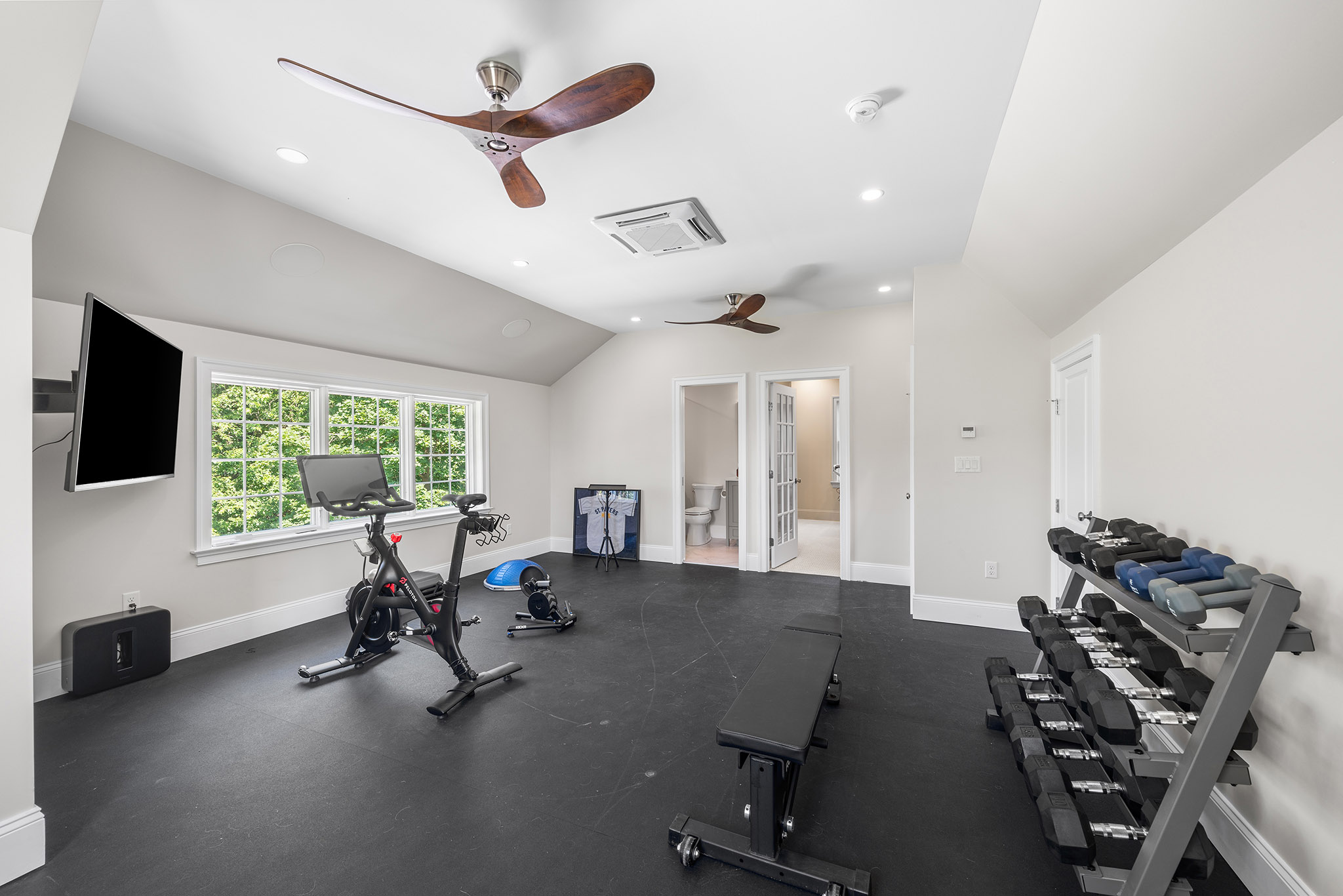 Domers Construction - Integrated and transformed unfinished garage and basement into indoor play area, mudroom, home gym, home brew bar, office, bathroom and bedroom